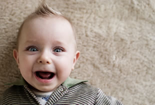 Baby happy about carpet cleaning Tulsa