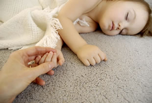 Child sleeping on carpet cleaning Tulsa