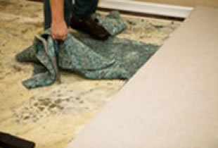 damaged carpet pad removal